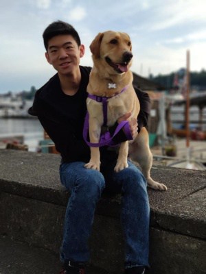 Man and dog sitting together