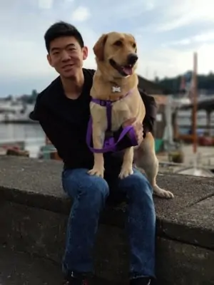 Man and dog sitting together