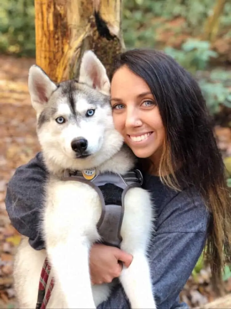 Girl hugging her dog