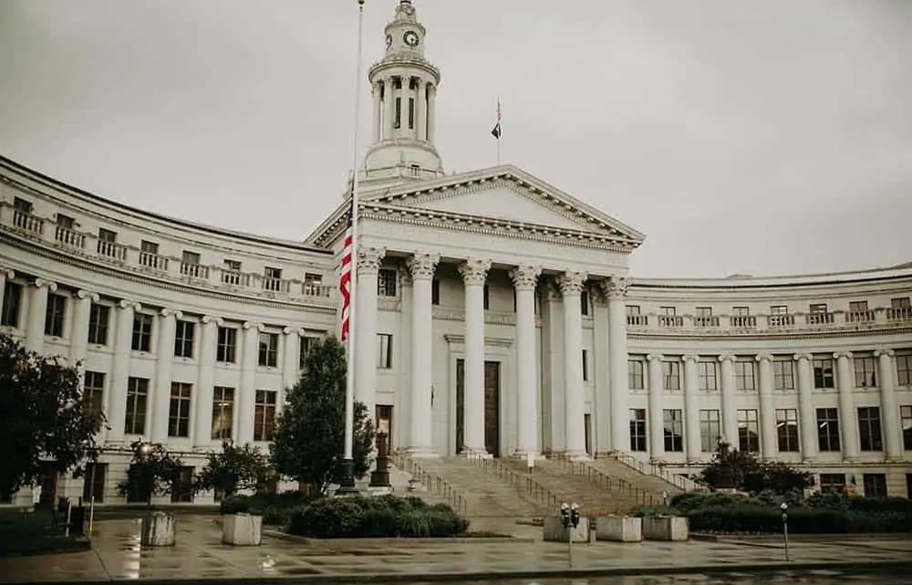 White building with tall pillars