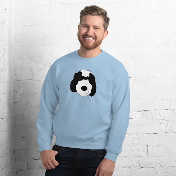 man wearing blue sweater with cartoon dog face