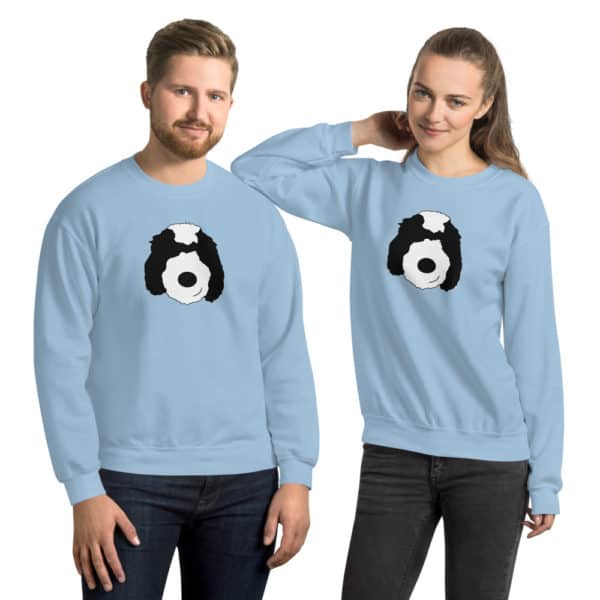 man and woman wearing matching blue sweaters