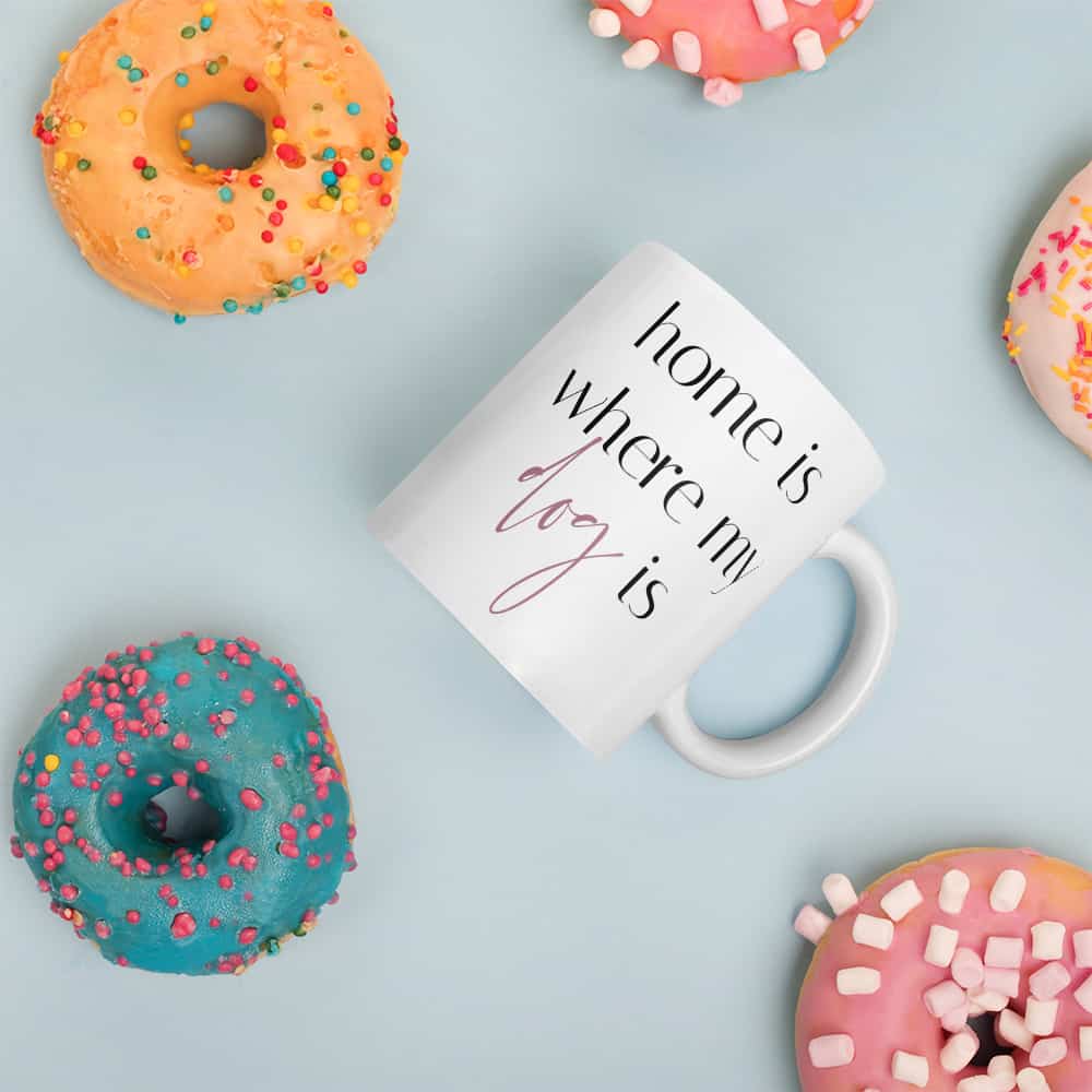 coffee mug and colorful donuts