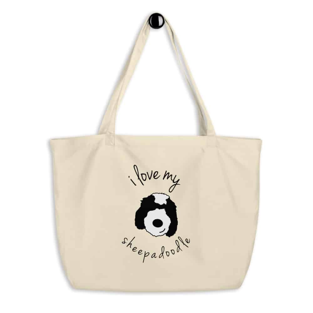 A tote with a cartoon dog face on it